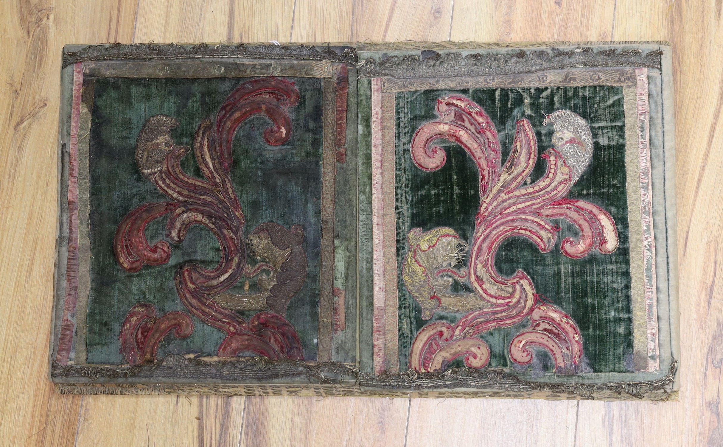 A desk blotter composed of 17th/18th century fabrics, 35x60cm